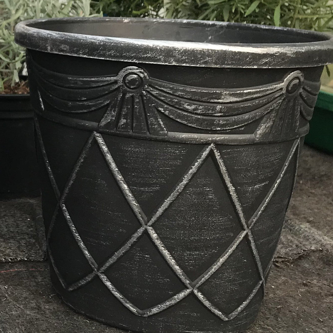 empty black plant pot